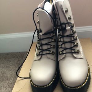 New size 8 Doc Martens.  Never worn.  Color is taupe. Comes in original box